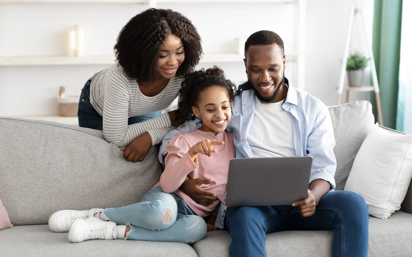 Family looking at a phone